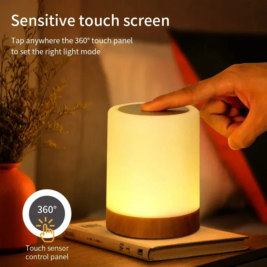 Hand touching a touch screen on a cylindrical light with text about a sensitive touch screen.